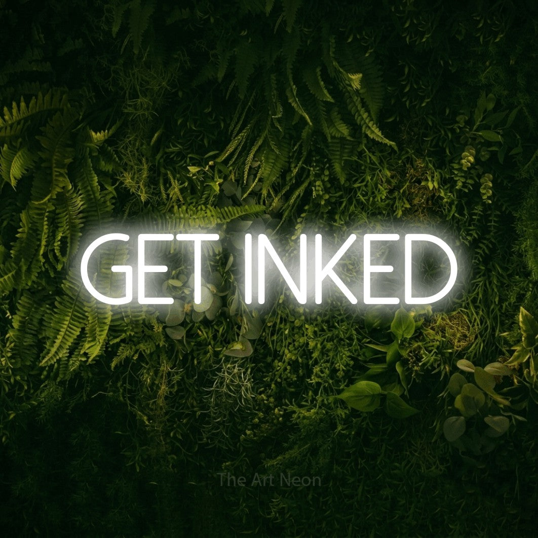 Cool white LED neon sign reading "Get Inked" against a moss-covered green wall for tattoo studio décor
