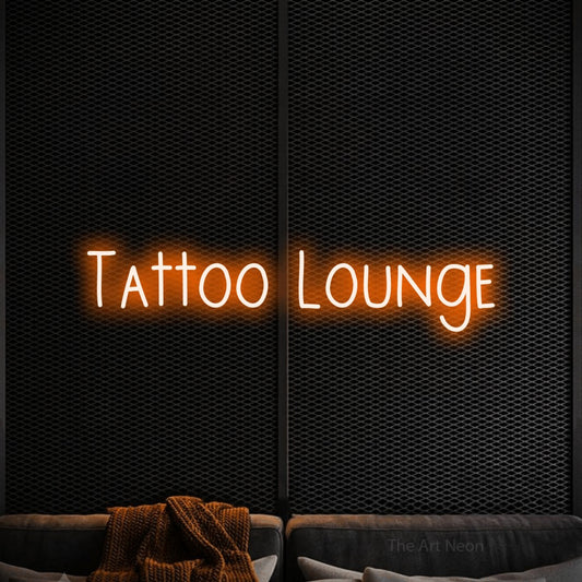 Orange LED neon sign reading "Tattoo Lounge" against a black textured wall for tattoo studio décor