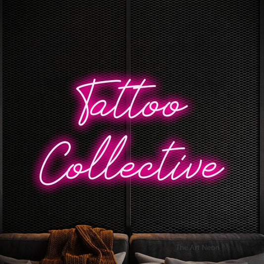 Hot pink script-style LED neon sign reading "Tattoo Collective" against a black textured wall for tattoo studio décor