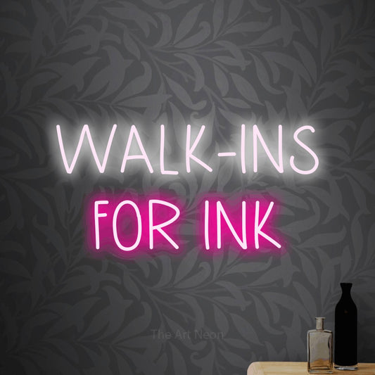 Hot pink and cool white LED neon sign reading "Walk-Ins for Ink" against light grey floral wallpaper for tattoo studio décor
