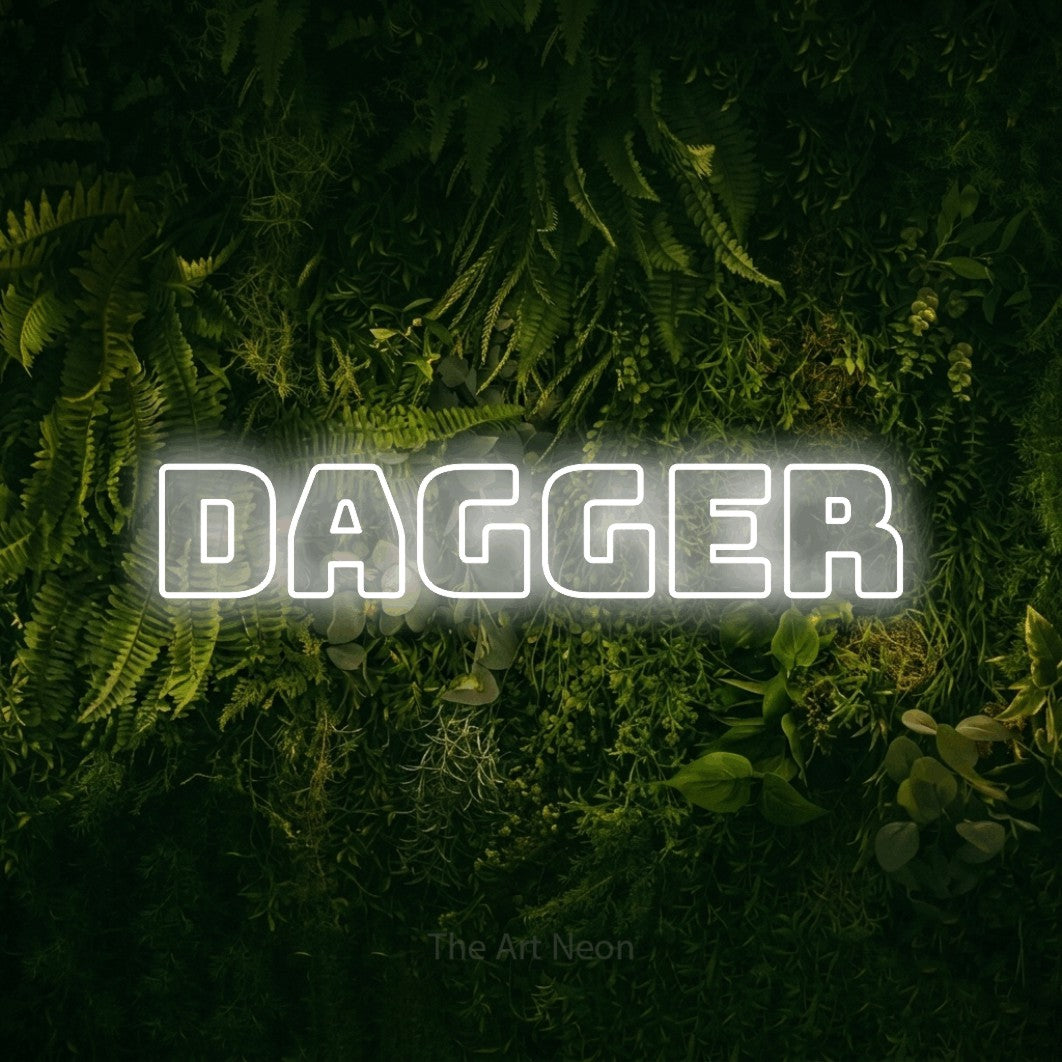 Cool white outline-style LED neon sign reading "Dagger" against a moss-covered green wall for tattoo studio décor