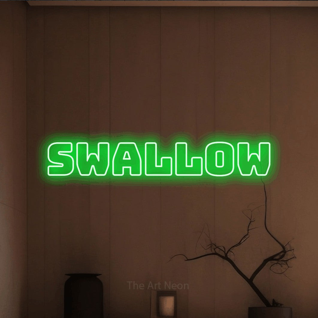 Green outline-style LED neon sign reading "Swallow" against a warm brown wall for tattoo studio décor
