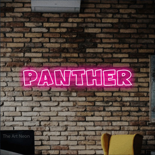 Hot pink outline-style LED neon sign reading "Panther" against a rustic brick wall for tattoo studio décor