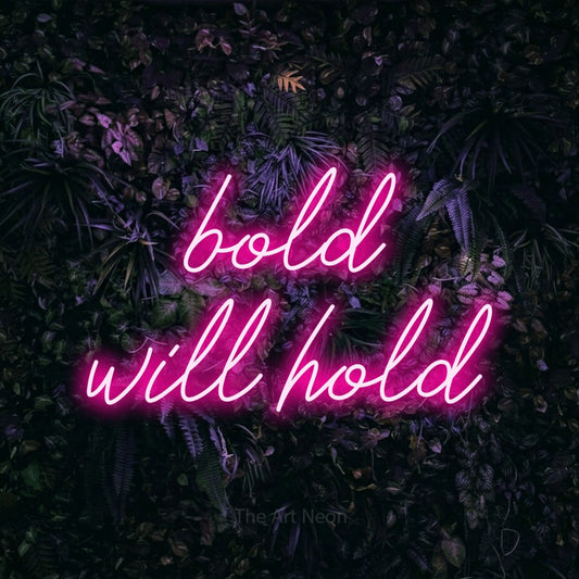Hot pink script-style LED neon sign reading "Bold Will Hold" against a purple floral wall for tattoo studio décor
