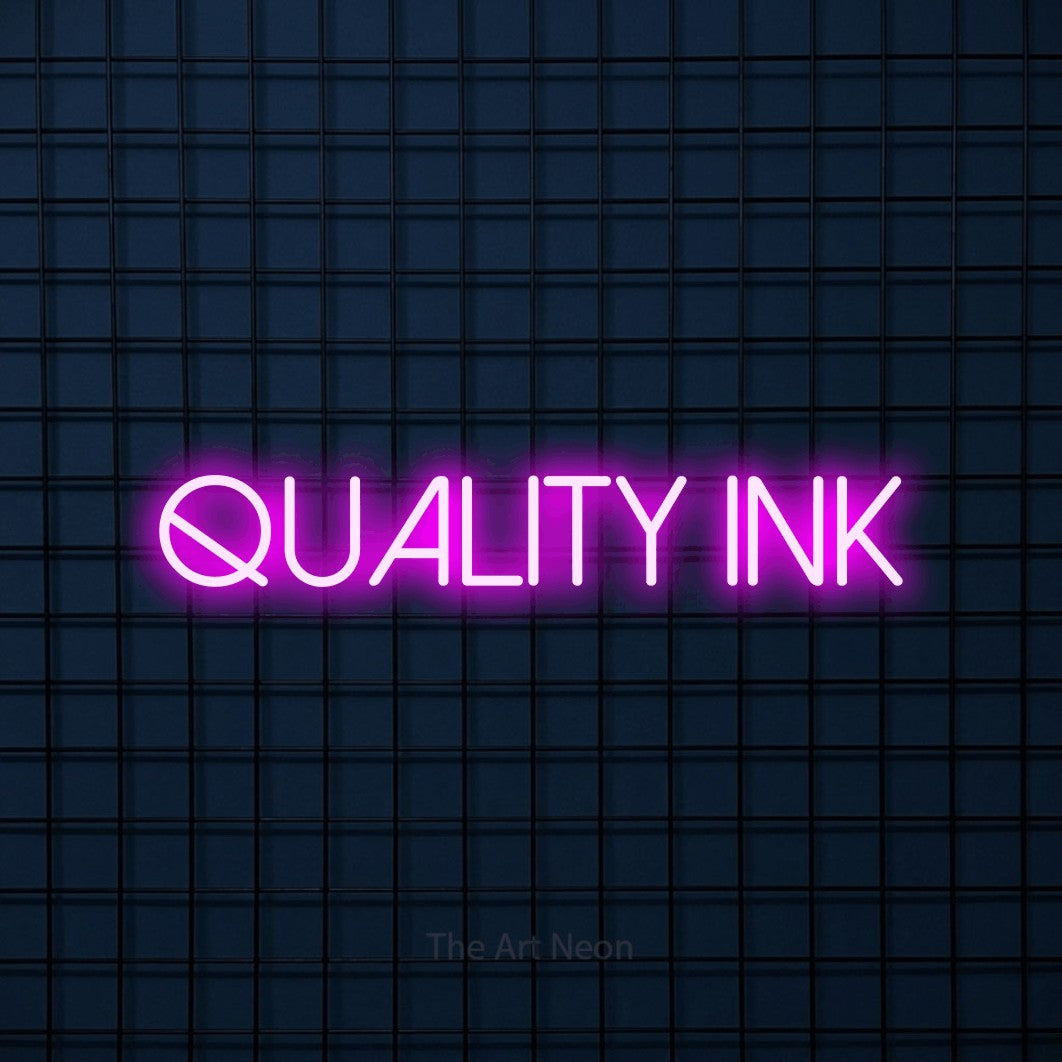 Pink LED neon sign reading "Quality Ink" against a dark blue tiled wall for tattoo studio décor
