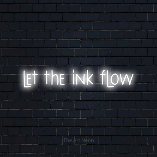 Cool white LED neon sign reading "Let the Ink Flow" against a dark navy brick wall for tattoo studio décor