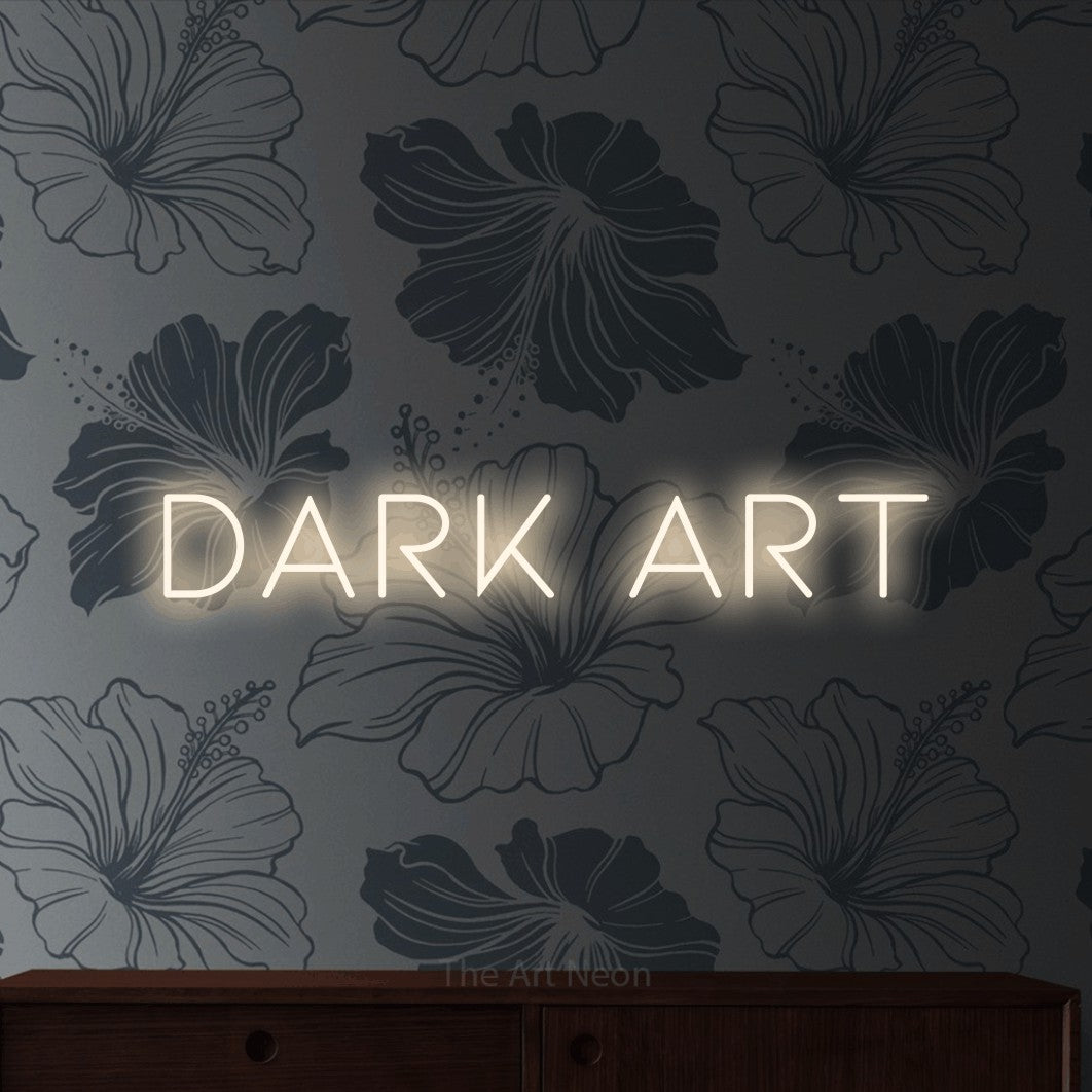 Warm white LED neon sign reading "Dark Art" against grey floral wallpaper for tattoo studio décor