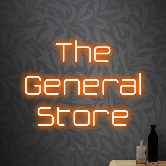 Orange LED neon sign reading "The General Store" against light grey floral wallpaper