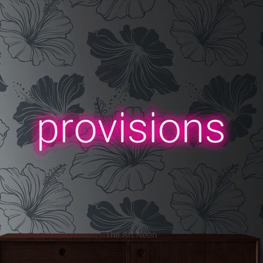 Hot pink LED neon sign reading "Provisions" against grey floral wallpaper