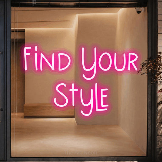 Hot pink LED neon sign reading "Find Your Style" against a warm beige alcove wall
