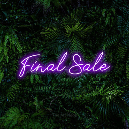 Purple script-style LED neon sign reading "Final Sale" against a dense tropical foliage wall