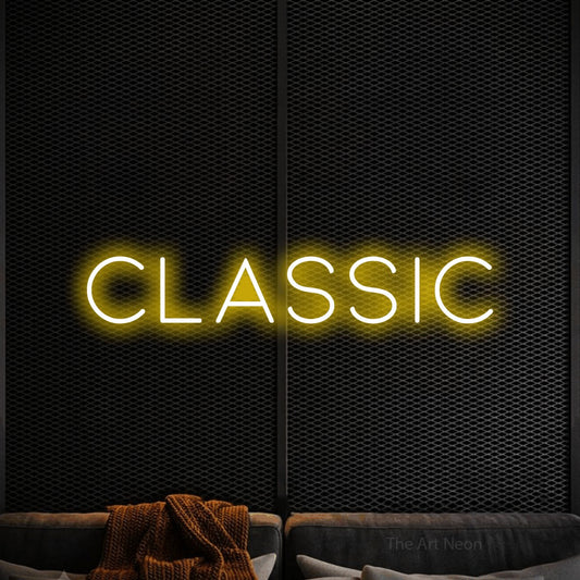 Yellow LED neon sign reading "Classic" against a black textured wall