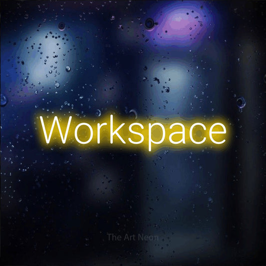Yellow LED neon sign reading "Workspace" against a dark blue bokeh background for office décor