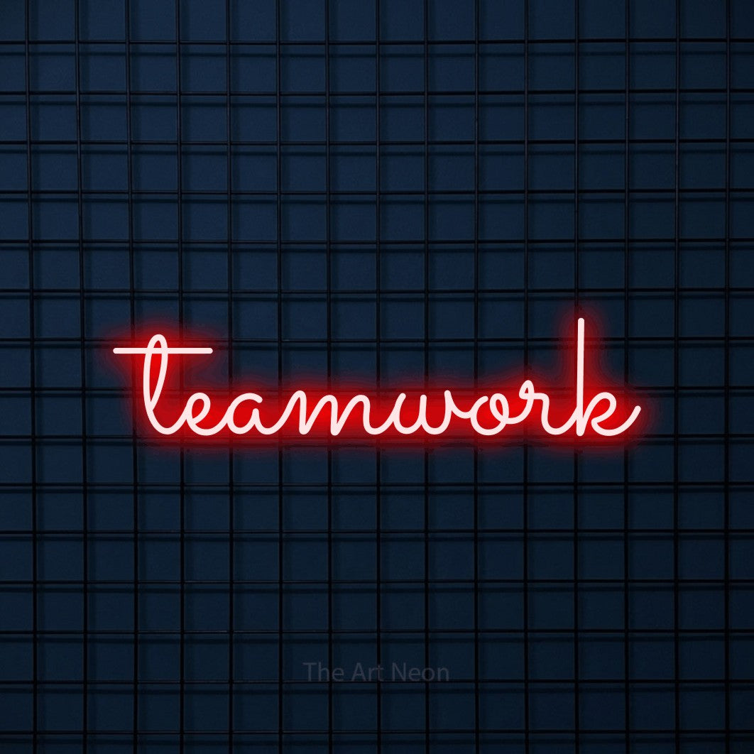 Red LED neon sign reading "Teamwork" against a dark blue tiled wall for office décor