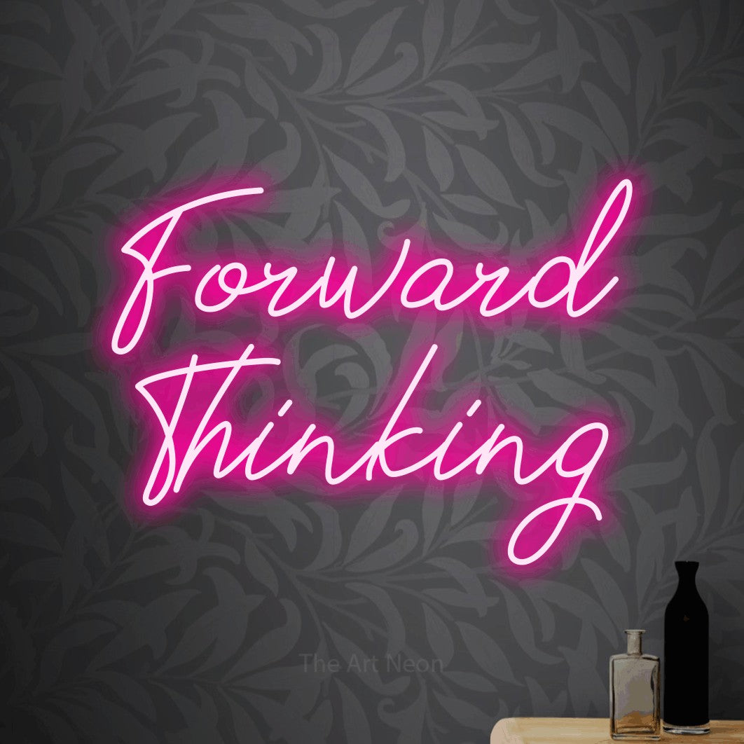 Hot pink script-style LED neon sign reading "Forward Thinking" against light grey floral wallpaper for office décor