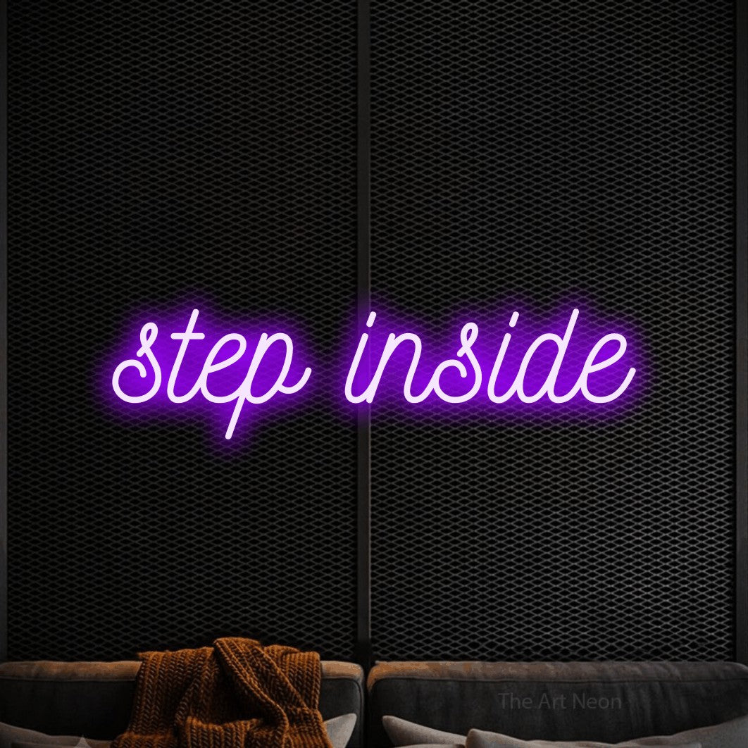 Purple script-style LED neon sign reading "Step Inside" against a black textured wall for office décor