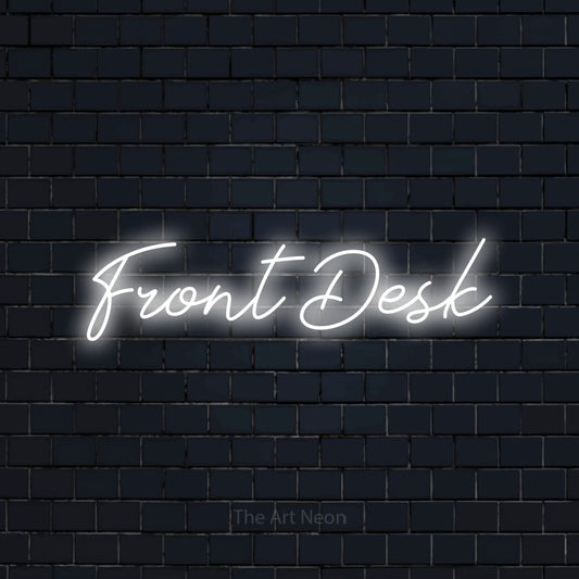 Cool white script-style LED neon sign reading "Front Desk" against a dark navy brick wall for hotel décor