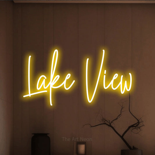 Yellow script-style LED neon sign reading "Lake View" against a warm brown wall for hotel décor