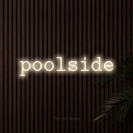 Warm white LED neon sign reading "Poolside" against dark wooden slats for hotel décor