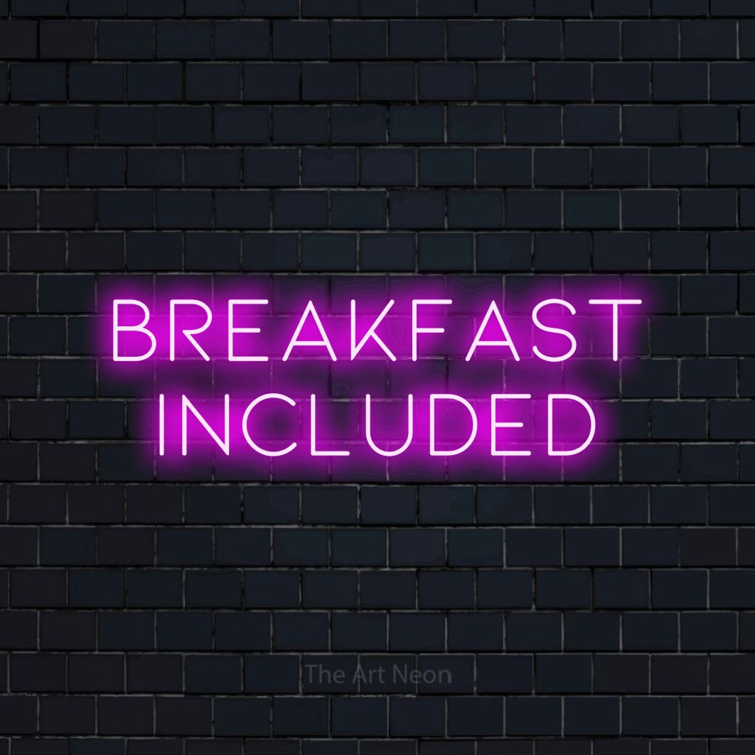 Pink LED neon sign reading "Breakfast Included" against a dark navy brick wall for hotel décor