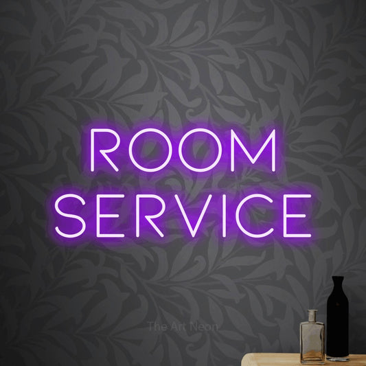 Purple LED neon sign reading "Room Service" against light grey floral wallpaper for hotel décor