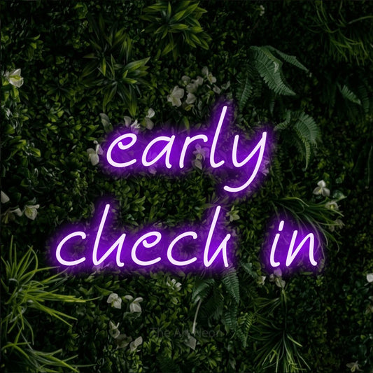 Purple LED neon sign reading "Early Check In" against a leafy green wall for hotel décor