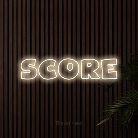 Warm white outline-style LED neon sign reading "Score" against dark wooden slats