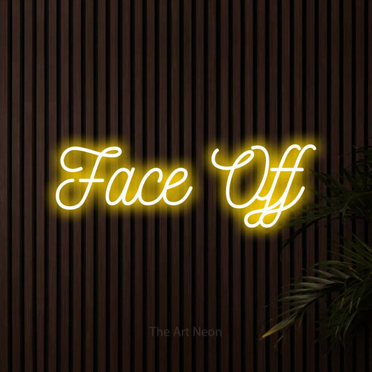Yellow script-style LED neon sign reading "Face Off" against dark wooden slats