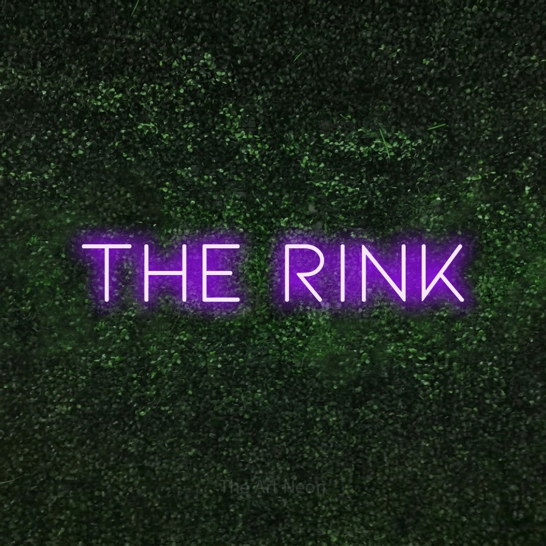 Purple LED neon sign reading "The Rink" against a textured green moss wall
