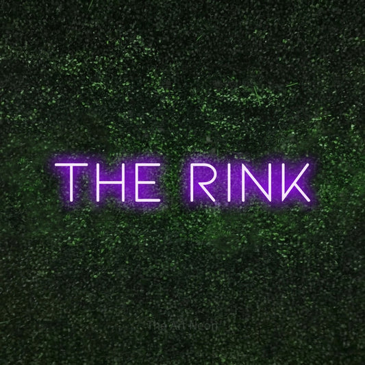 Purple LED neon sign reading "The Rink" against a textured green moss wall