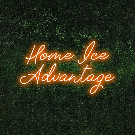Orange script-style LED neon sign reading "Home Ice Advantage" against a textured green moss wall