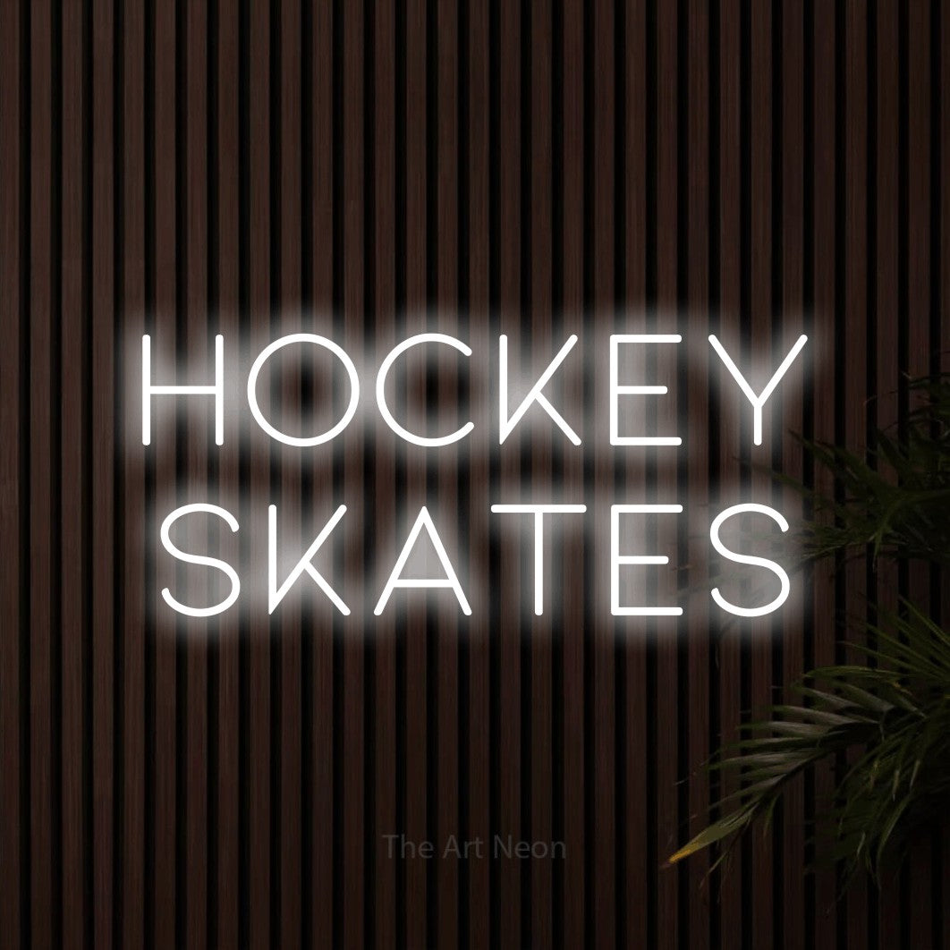Cool white LED neon sign reading "Hockey Skates" against dark wooden slats