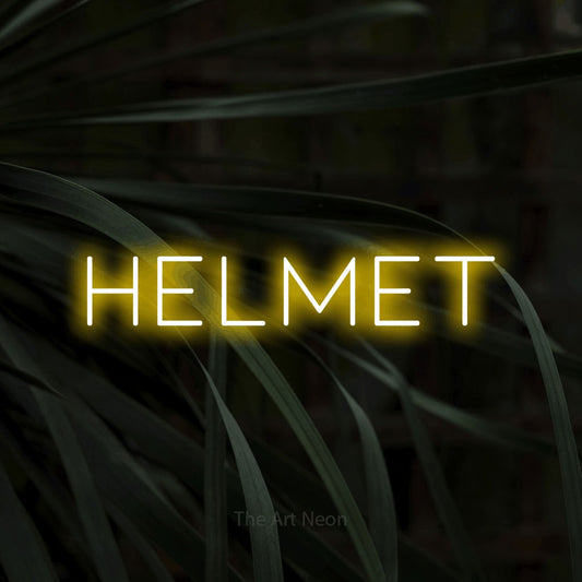 Yellow LED neon sign reading "Helmet" against dark tropical leaves