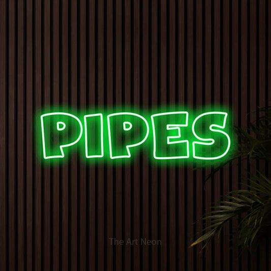 Enseigne néon à DEL à lumière verte, de style contour, affichant « Pipes » sur des lattes de bois foncé