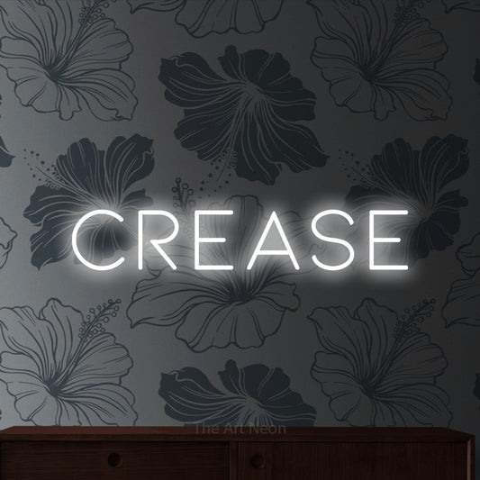 Enseigne néon à DEL à lumière blanche froide, affichant « Crease » sur un papier peint floral gris