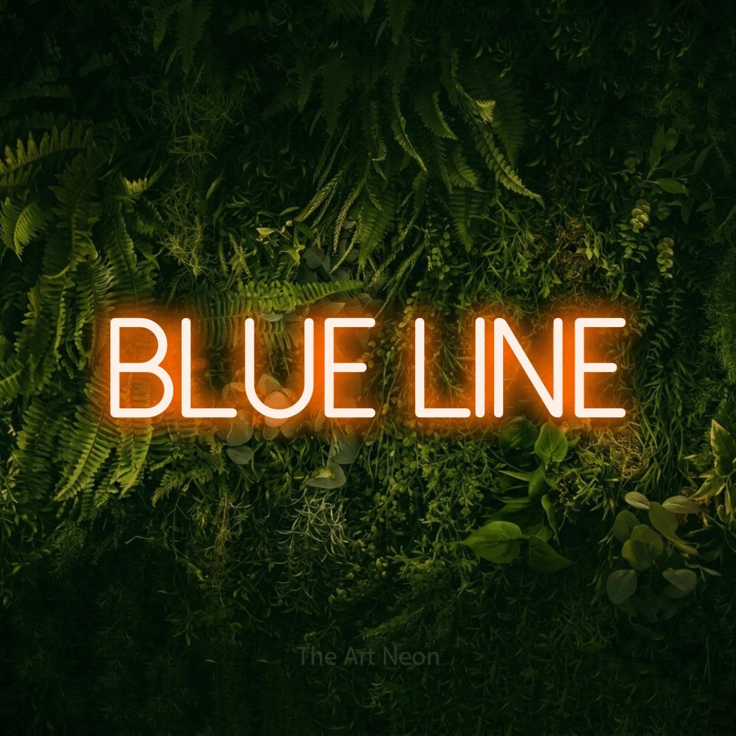 Orange LED neon sign reading "Blue Line" against a moss-covered green wall