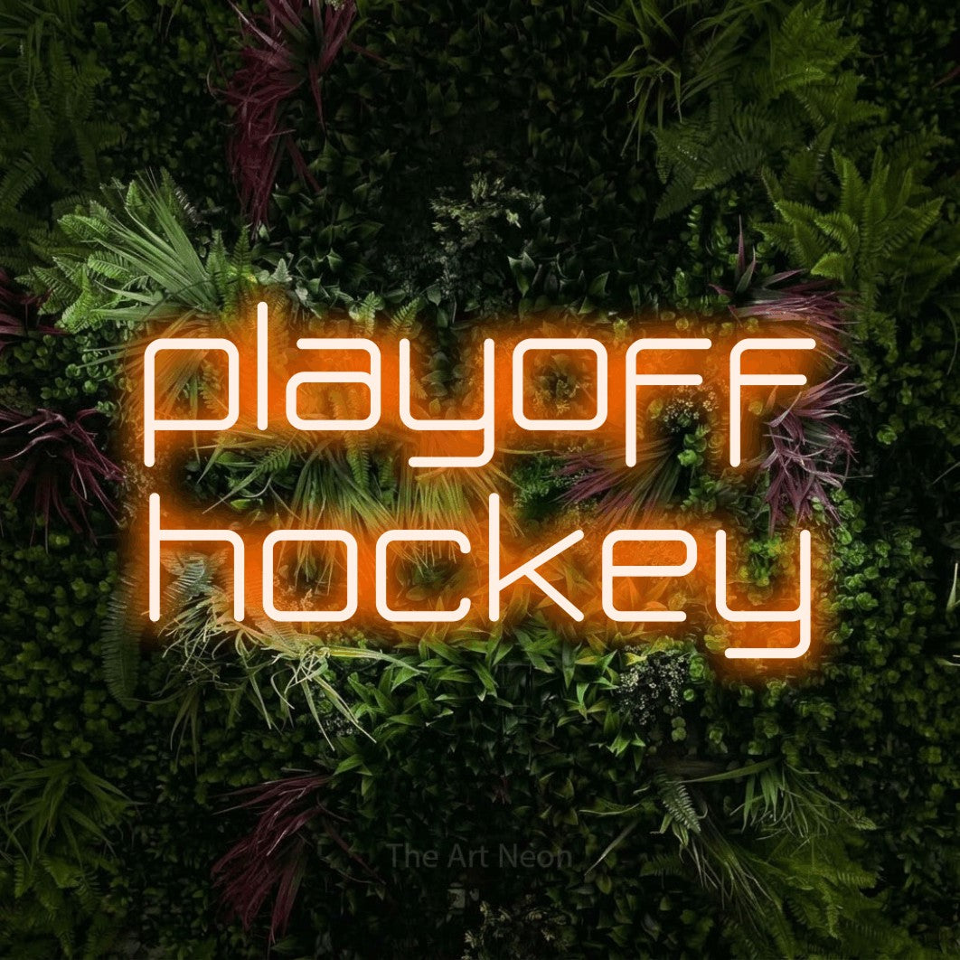 Orange LED neon sign reading "Playoff Hockey" against a lush garden wall with pink flowers