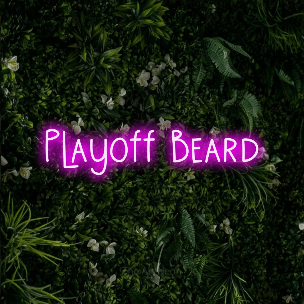 Pink LED neon sign reading "Playoff Beard" against a leafy green wall