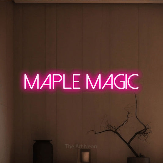 Enseigne néon à DEL à lumière rose vif, affichant « Maple Magic » sur un mur brun chaleureux