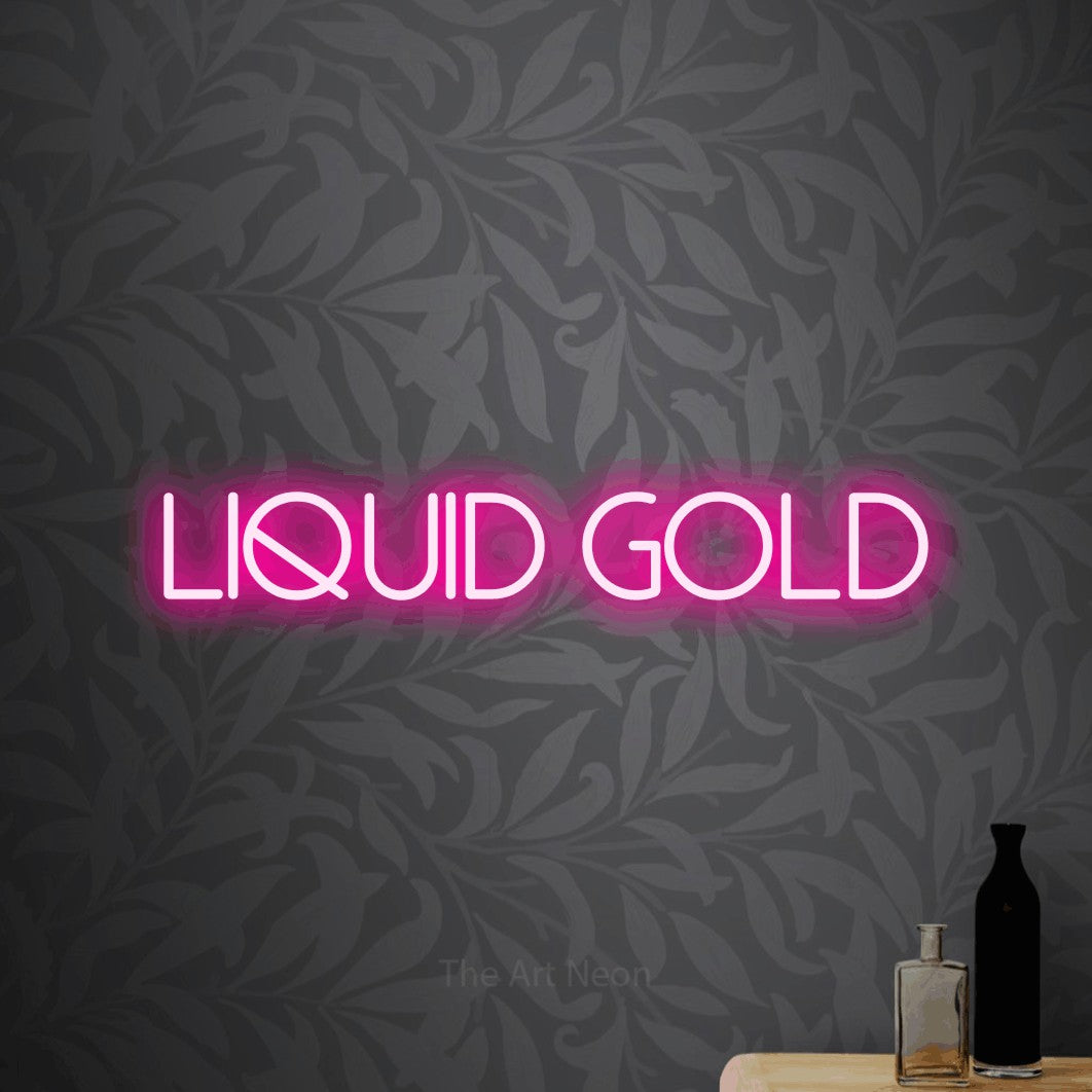 Hot pink LED neon sign reading "Liquid Gold" against light grey floral wallpaper