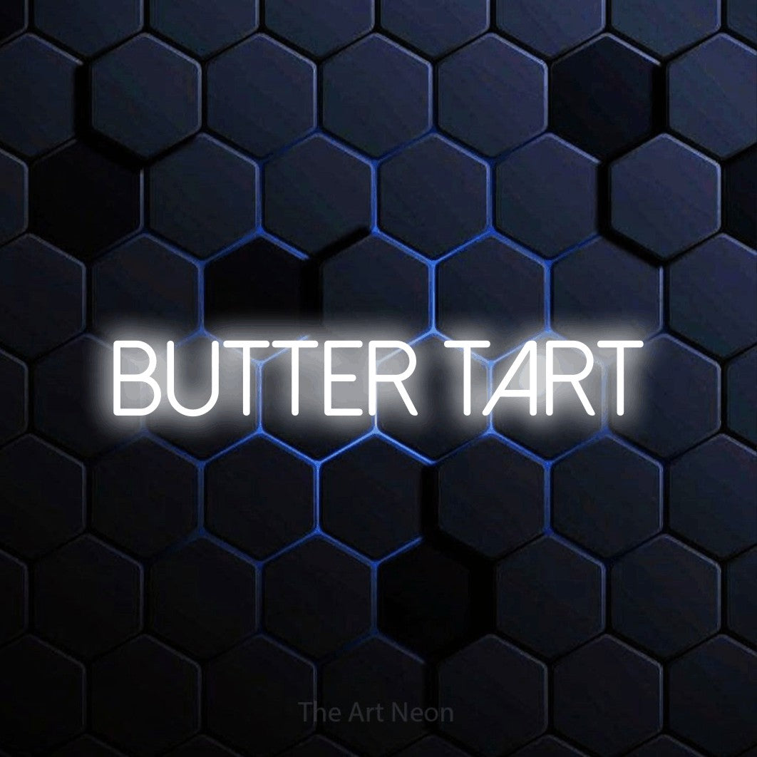 Cool white LED neon sign reading "Butter Tart" against a blue hexagonal wall