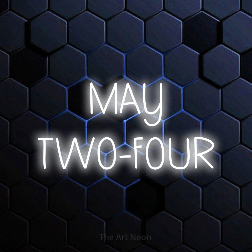 Cool white LED neon sign reading "May Two-Four" against a blue hexagonal wall