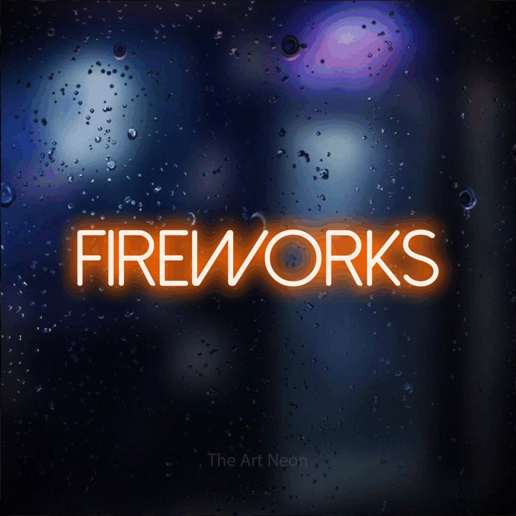 Enseigne néon à DEL à lumière orange, affichant « Fireworks » sur un arrière-plan bokeh bleu foncé