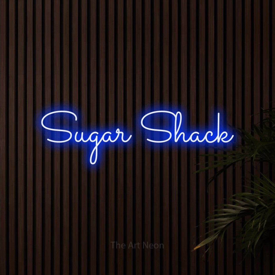 Blue LED neon sign reading "Sugar Shack" against dark wooden slats