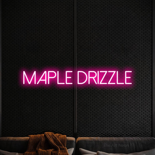 Hot pink LED neon sign reading "Maple Drizzle" against a black textured wall