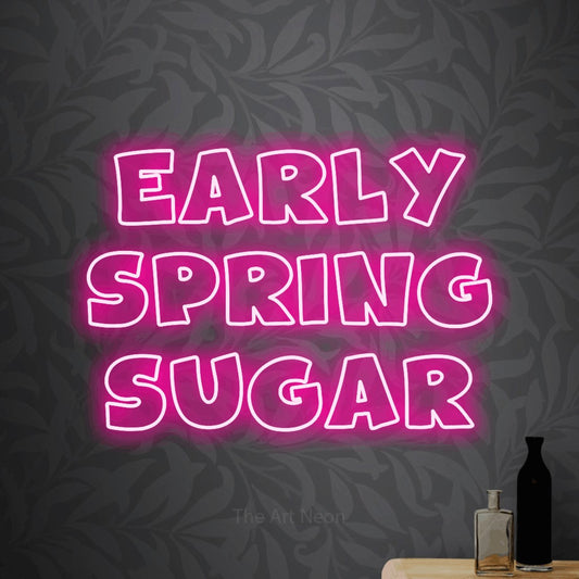 Hot pink outline-style LED neon sign reading "Early Spring Sugar" against light grey floral wallpaper