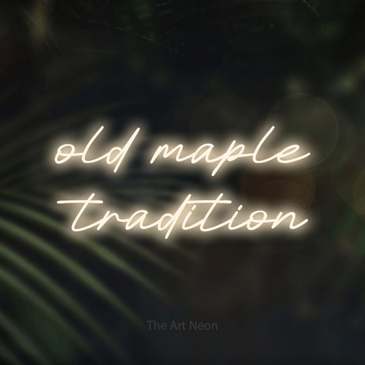 Warm white LED neon sign reading "Old Maple Tradition" against dark blurred palm leaves