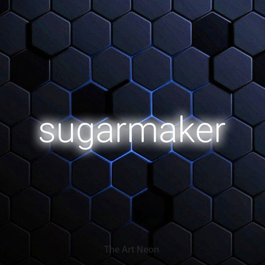 Cool white LED neon sign reading "Sugarmaker" against a blue hexagonal wall