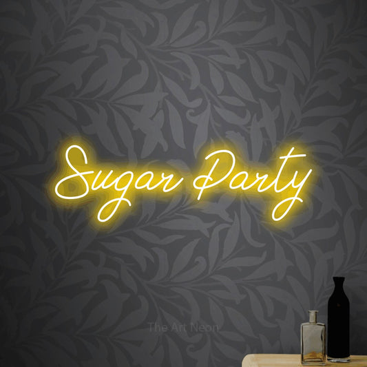 Yellow script-style LED neon sign reading "Sugar Party" against light grey floral wallpaper