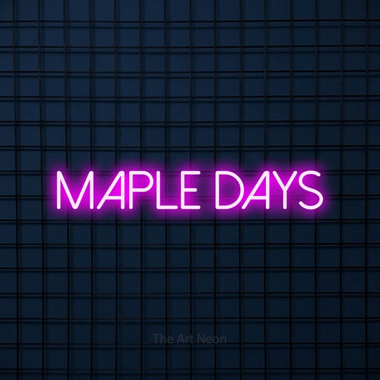Pink LED neon sign reading "Maple Days" against a dark blue tiled wall